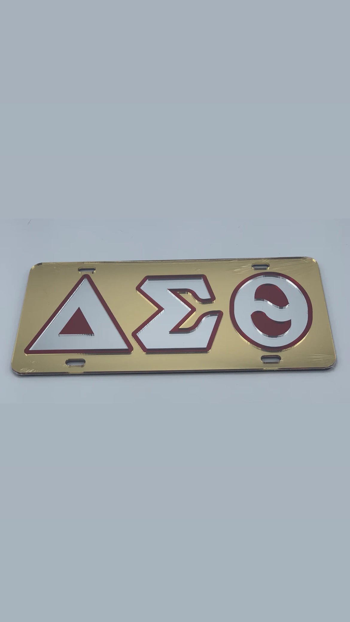 Delta Gold Outline Mirror Auto Tag