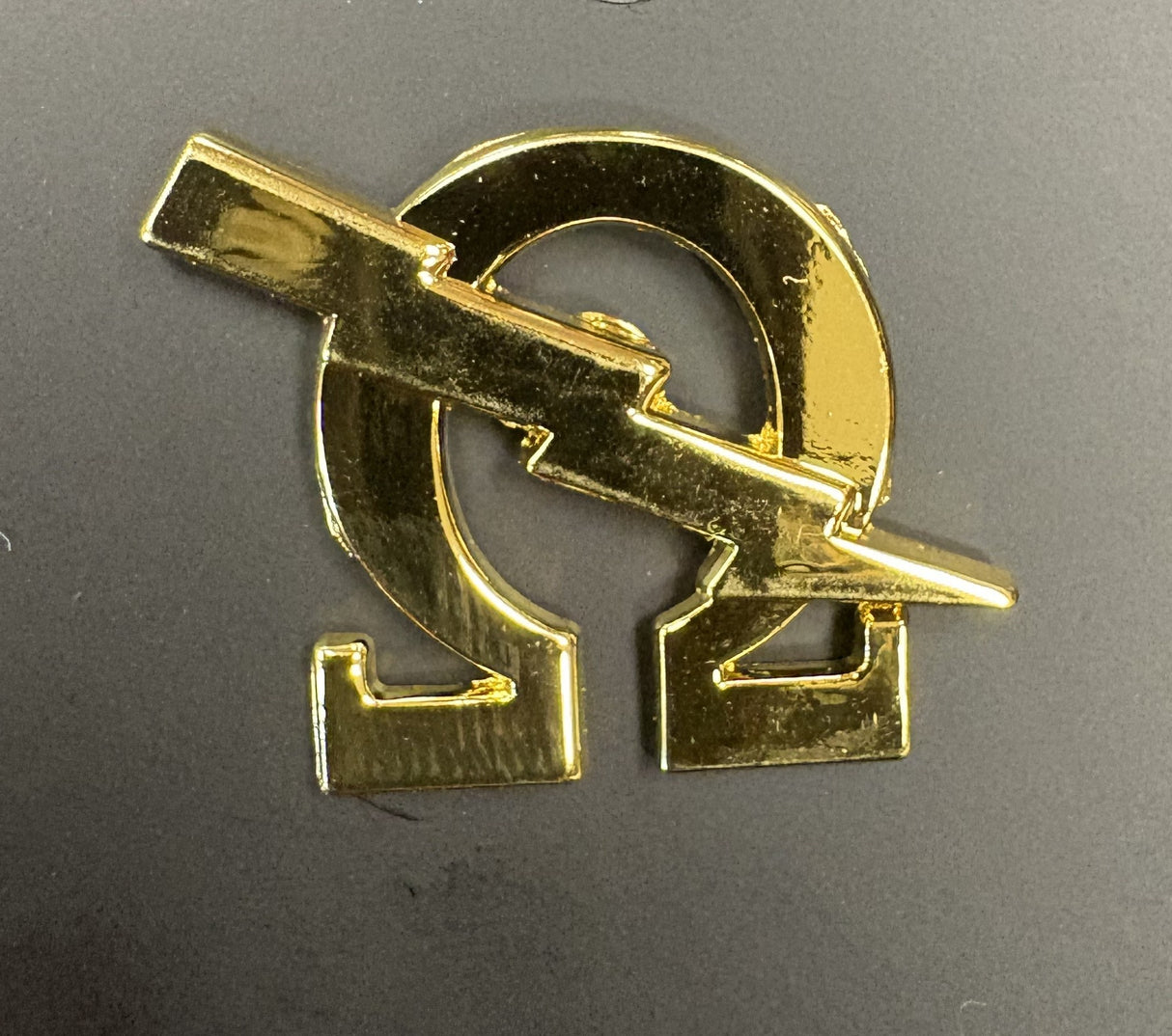 Omega Gold Lightning Bolt Lapel Pin
