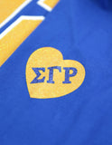 Sigma Gamma Rho 1922 Greek Ladies Long Sleeve Glitter Print Tee with Contrast neckband and heart on sleeve with Greek Letters Gold Tee with Blue White and Gold Print or Blue Tee with Blue White and Gold Print