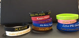 SGRho Embossed Silicone Wristband